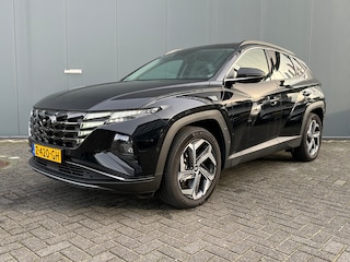 Hyundai Tucson 1.6 T-GDI PHEV 265pk Premium 4WD | Leder | Carplay | Climate | Keyless | Navigatie | Elek. Klep | Full - Led | 360 Camera | KRELL Audio | Elek. Stoelen | 19" Lichtmetaal | Winterpakket | Stoelventilatie | Dodehoek Detectie