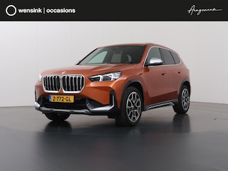 BMW X1 sDrive18i | X-Line | Panoramadak | Sportstoelen | Curved Display  | Camera | DAB | Apple CarPlay/Android Auto | Ele. verstelbare stoel + Geheugen | Harman/Kardon | Ele.kofferdeksel | Rijassistent Systeem |