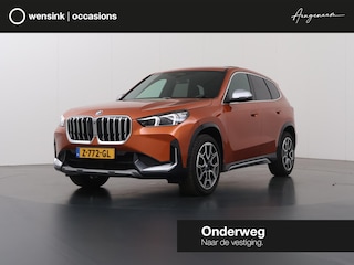 BMW X1 sDrive18i | X-Line | Panoramadak | Sportstoelen | Curved Display  | Camera | DAB | Apple CarPlay/Android Auto | Ele. verstelbare stoel + Geheugen | Harman/Kardon | Ele.kofferdeksel | Rijassistent Systeem |