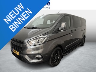 Ford Transit Custom 320 2.0 TDCI L2H1 Platinum Edition met o.a. een trekhaak, dodehoek detectie, elektrisch verwarmbare voorstoelen en een elektrisch verwarmbare voorruit