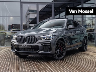 BMW X6 M50i High Executive | NL GELEVERDE AUTO | 1E EIGENAAR | 22 INCH | DRAVITGRAU | LASER | PANORAMA/SCHUIF-KANTELDAK | CARBON INTERIEURLIJSTEN | STOELVENTILATIE | INTEGRAL ACTIVE STEERING | TREKHAAK |