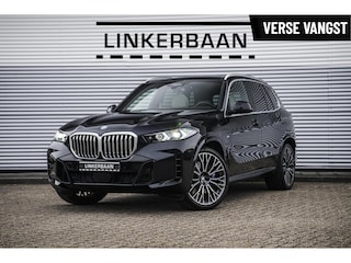 BMW X5 xDrive50e Hybride | Uniek | M Sport | Individual | B&W | Panodak | 4WS | Trekhaak | 22 inch | NL auto |