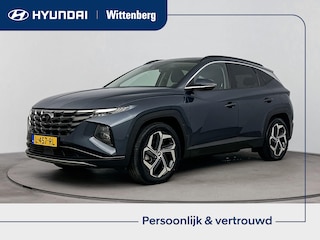 Hyundai Tucson 1.6 T-GDI PHEV PREMIUM SKY 4WD | SCHUIFDAK | 360 CAMERA | NAVI | CLIMA | CRUISE | 19'' LM VELGEN | STUUR- & STOELVERWARMING | ELEKTRISCHE ACHTERKLEP | APPLE CAR PLAY & ANDROID AUTO | LEDER | FABRIEKSGARANTIE GELDIG T/M 7-2026! |