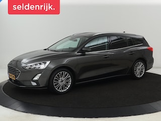 Ford Focus 1.0 EcoBoost Titanium | Trekhaak | Stoelverwarming | Adaptive cruise | Carplay | Navigatie | Stuurverwarming | Keyless | Full LED | B&O Sound | Climate control