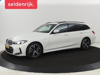 BMW 320e M Sport | Panoramadak | Trekhaak | Stoelverwarming | Carplay | Sportstoelen | Leder/Alcantara | Navigatie | Widescreen Display | Sfeerverlichting | Parkeerhulp | PHEV | Plug In
