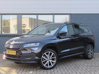 Skoda Karoq 1.5 TSi- DSG Sportline Business | verwarmde voorstoelen + achterbank | navigatie |