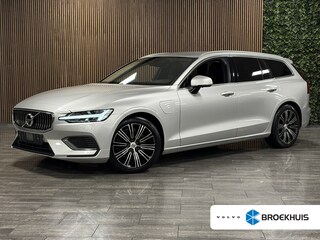 Volvo V60 T6 AWD Recharge Inscription Trekhaak | 360° Camera | Harman Kardon | Adaptieve Cruise Control | Standkachel met Volvo On Call App | Stoelverwarming voor+achter | Stuurwielverwarming | Full LED Meesturende koplampen | Pilot Assist | BLIS Dode Hoek Detectie | Elektrische voorstoelen geheugen | Lederen bekleding | Zitting verlenging voorstoelen | Gelamineerde/geluidwerende zijruiten | 18 Inch | Keyless Drive | Parkeersensoren voor+achter | Privacy Glass | Elektrisch bedienbare achterklep | DAB Radio | Apple Carplay/Android Auto | Bright Silver Metallic |