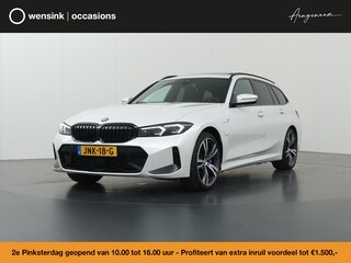 BMW 3-serie Touring 330e | M-Pakket | Panoramadak | Ele. stoelen + Geheugen | HUD | Sportstoelen | Camera | Apple CarPlay/Android auto | Adaptieve Cruise Control | Comfort Pakket | M-Sport Pro | HiFi | Curved Display |