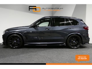 BMW X5 xDrive45e M Sport / Maxton Design Bodykit V.2 / Panoramadak / Soft-close / Koplamp Laser / Elektr. verstelbare voorstoelen + memory / Luchtvering / Stoelverwarming voor + achter / Stoelventilatie / Head-Up Display / Apple Carplay - Andriod Auto / Ambiente verlichting / Driving Assistent Professional / 22'' LMV / Koplamp BMW Shadow-Line / M Aerodynamica / Shadow-Line