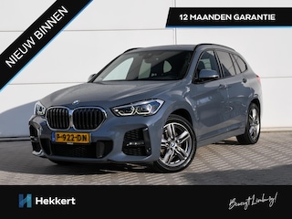 BMW X1 High Executive sDrive18i 140pk Automaat HALF-LEDER | 18''LM | ADAPT. CRUISE | STORLVERW. VOOR | NAVI | PDC + CAM.