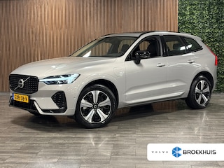 Volvo XC60 T6 AWD Recharge Ultra Dark | Trekhaak | All Season banden | 360° Camera | Head-Up Display | Harman Kardon | Stoelverwarming voor+achter | Stuurwielverwarming | Full LED Meesturende koplampen | Pilot Assist | BLIS Dode Hoek Detectie | Elektrische voorstoelen geheugen | Lederen bekleding | Zitting verlenging voorstoelen | Lederen dashboard | Schuifdak | 19 Inch | Google Infotainment | Keyless Drive | Parkeersensoren voor+achter | Elektrisch bedienbare achterklep | Draadloos telefoon opladen | DAB Radio | Apple Carplay/Android Auto | Volvo On Call met mobiele App functie | Silver Dawn Metallic |