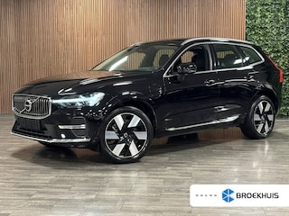 Volvo XC60 T6 AWD Recharge Ultra Bright Head-Up Display | Harman Kardon | Adaptieve Cruise Control | Standkachel met Volvo On Call App | Stoelverwarming voor+achter | Stuurwielverwarming | Full LED meesturende koplampen | Pilot Assist | BLIS Dode Hoek Detectie | Parkeercamera | Elektrische voorstoelen geheugen | Lederen bekleding | Zitting verlenging voorstoelen | Lederen dashboard | 20 Inch | Schuifdak | Google Infotainment | Keyless Drive | Elektrisch bedienbare achterklep | Draadloos telefoon opladen | DAB Radio | Apple Carplay/Android Auto | Onyx Black Metallic |