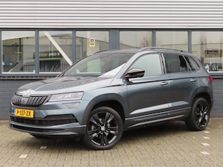 Skoda Karoq 1.5 TSI ACT Sportline Business DSG | trekhaak wegklapbaar | stoel + stuurwielverwarming | camera | elektrische achterklep