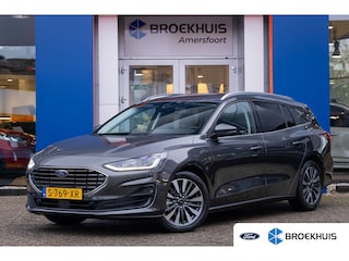 Ford Focus Wagon 1.0 EcoBoost Hybrid Titanium X | | Trekhaak | Cruise adaptief | Camera | Stuur/stoel/voorruit verwarming | Dodehoek detectie | Apple Carplay/Android Auto | Achteruitrijcamera | Apple Carplay/Android Auto|telefoonintegratie premium | Cruise control adaptief met Stop&Go en stuurhulp
