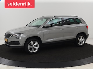 Skoda Karoq 1.0 TSI Ambition Business | Stoelverwarming | Trekhaak | Carplay | Navigatie | Parkeerhulp | Climate control | Chroom delen | DAB | Getint glas | Cruise control