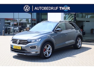 Volkswagen T-Roc 1.5 TSI Sport Business R 110KW-150PK DSG, 4 Seizoenenbanden, Dodehoek sensor, R Line in en exterieur, digital cockpit, panoramadak, navigatie, DAB+, winterpakket met stoelverwarming spiegel pakket privacy glas chrome dakrail led koplampen adaptieve cruise control door ons geleverd en onderhouden