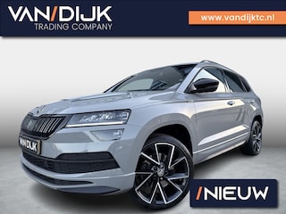 Skoda Karoq 1.5 TSI ACT Sportline Business 150PK ✓Virtual Cockpit ✓Full LED ✓Navigatie Full Map ✓Camera ✓Apple Carplay & Android Auto ✓Climate ✓Cruise ✓Stoel- stuurverwarming ✓Parkeersensoren ✓Trekhaak ✓Lichtmetaal 19