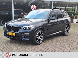 BMW X3 xDrive30e Hybride M-Sport Full Options/Panodak/Trekhaak/Leer/HUD/Stuur en stoel verwarming/360 Camera/Adaptive Licht/Led/Elektrisch stoelverstelling/Key Less/ Carbon Zwart/ Dealer onderhouden M