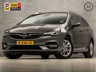 Opel Astra Sports Tourer 1.2 Elegance 146Pk (APPLE CARPLAY, GROOT NAVI, CLIMATE, CAMERA, LEDER, GETINT GLAS, SPORTSTOELEN, KEYLESS, LANE ASSIST, LED KOPLAMPEN, DAB+, LM VELGEN, NIEUWSTAAT)