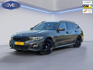 BMW 3-serie Touring 330e M sport individual, dravitgrau, panoramadak ,laser,elec bedienbare trekhaak, vol opties, nl auto met nap
