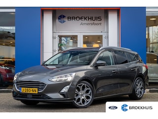 Ford Focus Wagon 1.0 EcoBoost Titanium Business | Trekhaak | Camera | Cruise adaptief | Stoel/stuur/voorruit verwarming | LED | Apple Carplay/Android Auto | Keyless | Navi | Apple Carplay/Android Auto|telefoonintegratie premium | Cruise control adaptief met Stop&Go en stuurhulp | Keyless entry