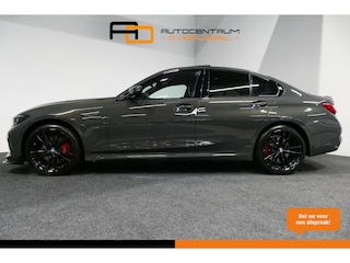 BMW 330e xDrive M Sport / M340i Diffuser / Black Diamond M Grill / M340i M Sport bumper pakket / Schuif-/kanteldak / Premium kleur Dravitgrau / Apple Carplay - Android Auto / Stoelverwarming / Ambienteverlichting / 19'' LMV / Stuurwiel verwarming / Full LED / Keyless / Koplamp BMW Individual Shadow Line / Draadloze telefoonlader / Active Cruise Control / Navigatie / DAB+