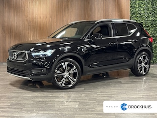 Volvo XC40 T5 Recharge Inscription Parkeercamera | 19 Inch | Cruise Control | Zitting verlenging voorstoelen | Keyless Drive | Parkeersensoren voor+achter | Privacy Glass | Elektrisch bedienbare achterklep | Breedstralers in voorbumper | Climate Control L+R | DAB Radio | Apple Carplay/Android Auto | Volvo On Call met mobiele App functie |