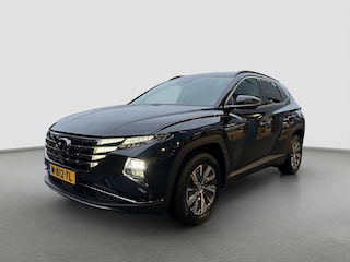 Hyundai Tucson 1.6 T-GDI HEV 230pk Comfort | Climate controle | Trekhaak | Camera | Carplay | Adaptive cruise controle | Draadloos laden | Keyless entry | Navigatie | Parkeersensoren | Stoelverwarming