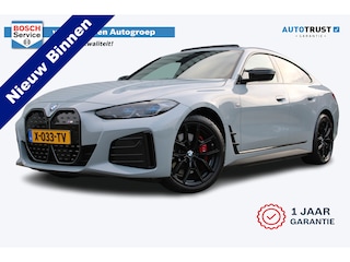BMW i4 M50 High Executive 84 kWh | Incl. 12 maanden garantie | Assisted driving | Climate control | 360° camera | Uitklapbare trekhaak | Stoel/stuurverwarming | Head-up display | Schuif/kantel dak |