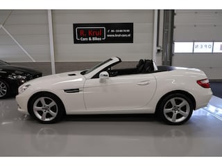 Mercedes-Benz SLK 200 Leer Airscarf Panoramadak Sportstoelen Nekverwarming Metallic wit 17 inch Sportvelgen Nette staat Onderhoud volledig aanwezig Windscherm
