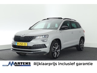 Skoda Karoq 1.5 TSI 150pk DSG Sportline Business Panoramadak Stoelverwarming Navigatie Canton Audio Camera Keyless Virtual Cockpit