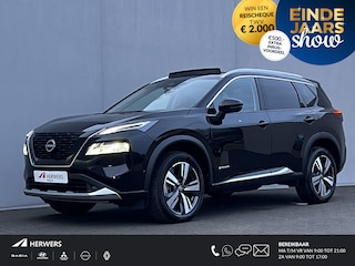 Nissan X-Trail 1.5 e-Power Tekna Automaat / Fabrieksgarantie tot 03-2028 < 100.000km / Leder / Panorama schuifdak / Elektrische stoelen en klep / Stuur-, stoel- & achterbankverwarming / Navi / HUD / Camera 360° / LM 19" wielen + All Season banden /