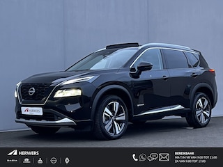Nissan X-Trail 1.5 e-Power Tekna Automaat / Fabrieksgarantie tot 03-2028 < 100.000km / Leder / Panorama schuifdak / Elektrische stoelen en klep / Stuur-, stoel- & achterbankverwarming / Navi / HUD / Camera 360° / LM 19" wielen + All Season banden /