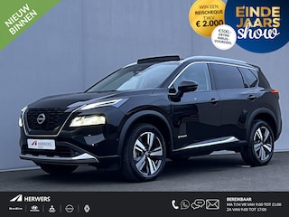 Nissan X-Trail 1.5 e-Power Tekna Automaat / Fabrieksgarantie tot 03-2028 < 100.000km / Leder / Panorama schuifdak / Elektrische stoelen en klep / Stuur-, stoel- & achterbankverwarming / Navi / HUD / Camera 360° / LM 19" wielen + All Season banden /