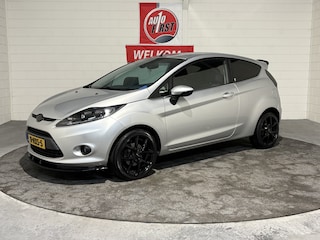 Ford Fiesta 1.25 Ghia, Superstoer, 16 inch, Clima, Parkeerhulp, Frontsplitter, Cameleon ruit, Achterspoiler, Sportdemper, Android radio, Apk 12-26