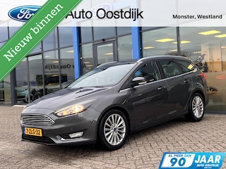 Ford Focus 1.0 Titanium 125PK NIEUWE DISTRIBUTIERIEM!! Voorruitverwarming Climate Cruise Parkeersensoren Navi 17" Velgen *Dealer Onderhouden*