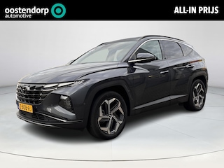 Hyundai Tucson 1.6 T-GDI PHEV Premium 4WD Lederen bekleding | Stoel- en stuurverwarming | 4WD | Navigatiesysteem | Climate Control | Adaptieve Cruise Control | Plug Inn hybride | Full options | Resterende fabrieksgarantie
