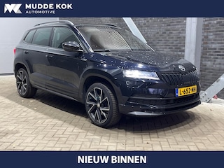 Skoda Karoq 1.5 TSI ACT Sportline Business | Trekhaak | ACC | Camera | Stuur+Stoelverwarming | Navigatie