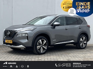Nissan X-Trail 1.5 e-4orce Tekna 4WD 7p. Automaat / Trekhaak (Trekgewicht 1.650kg) / HUD / Stuur- en Stoelverwarming voor en achter / 360° Camera / Adaptieve Cruise Control / Elektrisch Verstelbare Bestuurdersstoel en Passagiersstoel met geheugenset / Climate Control / Keyless Entry & Start / Apple Carplay & Android Auto / Parkeersensoren voor + achter / Elektrische Achterklep / Navigatie full map