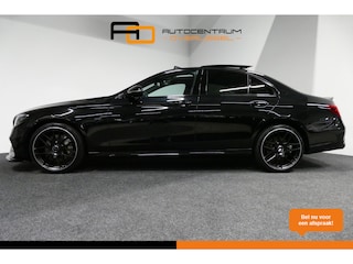 Mercedes-Benz E-klasse 300 e AMG Line / E63s AMG Diffuser / Panamericana Grille / Panoramadak / Elektr. verstelbare voorstoelen + memory / Burmester Surround Sound / Ambienteverlichting / Apple Carplay - Android Auto / Maxton Design Frontlip / Rondomzichtcamera / Stoelverwarming / Navigatie / Achteruitrijcamera / 20'' LMV / Night pakket