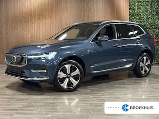 Volvo XC60 T6 AWD Recharge Plus Bright Trekhaak | All Season banden | Harman Kardon | Adaptieve Cruise Control | Standkachel met Volvo On Call App | Stoelverwarming voor+achter | Stuurwielverwarming | Parkeercamera | Full LED Meesturende koplampen | Pilot Assist | BLIS Dode Hoek Detectie | Elekrische voorstoelen geheugen | Contour Stoelen met wit stiksel en bies | Zitting verlenging voorstoelen | Schuifdak | 19 Inch | Google Infotainment | Keyless Drive | Parkeersensoren voor+achter | Privacy Glass | Elektrisch bedienbare achterklep | DAB Radio | Apple Carplay/Android Auto | Draadloos telefoon opladen | Denim Blue Metallic |