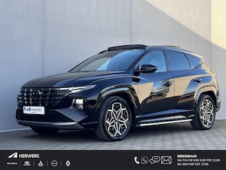 Hyundai Tucson 1.6 T-GDI HEV 230pk N Line Sky Fabrieksgarantie tot 04-2029 / Dealer onderhouden / 1.650kg Trekgewicht / Panorama schuifdak / Stuur-, stoel- en achterbankverwarming / Apple Carplay Android / 19" LM wielen /