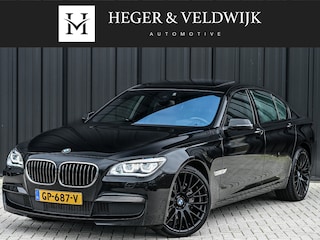BMW 740i · M-sport · NL-auto · 360 Camera · Active cruise · Memory seats · Comfort access · Harman/Kardon · Schuif-/kanteldak · Achterbank verwarmd