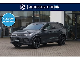 Volkswagen Tiguan 1.5 eHybrid R-Line Edition 204PK / 150kW LED Matrix IQ.Light, 360° rondomzichtcamera, panoramisch schuif-, kanteldak, elektr. bedienbaar, head-up display, verwarm- en ventileerbare voorstoelen met massagefunctie, Keyless Entry & Start, verwarmbare achterbank, elektr. bedienbare achterklep (Easy Open), 3- zone Climatronic, dodehoekdetectie (Side Assist), autonome parkeerfunctie (Park Assist), navigatie, soundsysteem 'Harman Kadon', verwarmbare voorruit, achteruitrijcamera, Apple Carplay & Android Auto, draadloos telefoon laden, 20'' LMV 'York'