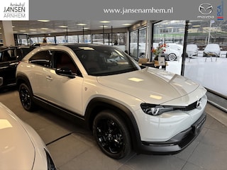 Mazda MX-30 e-SkyActiv R-EV 170 Nagisa , Demovoordeel € 9.250-, Half Leder, Bose, Adap.Cruise, Navi, Apple Carplay, Clima, Camera, PDC, HUD, Stuur/Stoelverwarming, 18" LMV