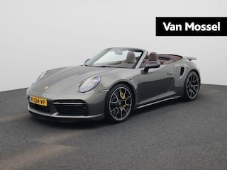 Porsche 911 Cabrio 3.8 Turbo S | SPORTDESIGN CARBON | SPORTCHRONO | NL GELEVERD | 1E EIGENAAR | BURMESTER | KERAMISCH | BRUINE SOFTTOP | STOELVENTILATIE | AVENTURIEN GROEN | PASM | SPORTUITLAATSYSTEEM | 18-WEG STOELEN | PTV PLUS | PDLS PLUS | LIFTSYSTEEM | 360 CAMERA |