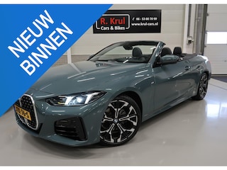 BMW 4-serie Cabrio 420i High Executive M-Sport Sportstoelen Camera Stoelverwarming Curved dashboard Navigatie Airco-ecc 19 inch Sportvelgen App connect Cape York Green metallic Zwart sportleer