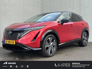 Nissan Ariya Evolve 91 kWh / Warmtepomp / Stuur- & Stoelverwarming / Voorruitverwarming / Geventileerde Voorstoelen / Binnenspiegel Camera / Schuif & Kanteldak / Head-Up Display / Bose Premium Audio / Adaptieve Cruise Control / Apple Carplay & Android Auto /