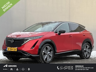 Nissan Ariya Evolve 91 kWh / Warmtepomp / Stuur- & Stoelverwarming / Voorruitverwarming / Geventileerde Voorstoelen / Binnenspiegel Camera / Schuif & Kanteldak / Head-Up Display / Bose Premium Audio / Adaptieve Cruise Control / Apple Carplay & Android Auto /