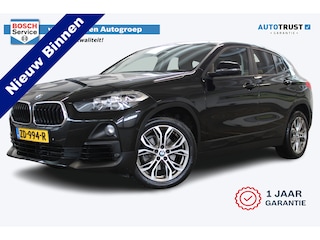 BMW X2 sDrive18i High Executive | Incl. 12 maanden garantie | Cruise control | Climate control | Stoelverwarming | Trekhaak | Parkeercamera | Parkeersensoren | Navigatie | Bluetooth |